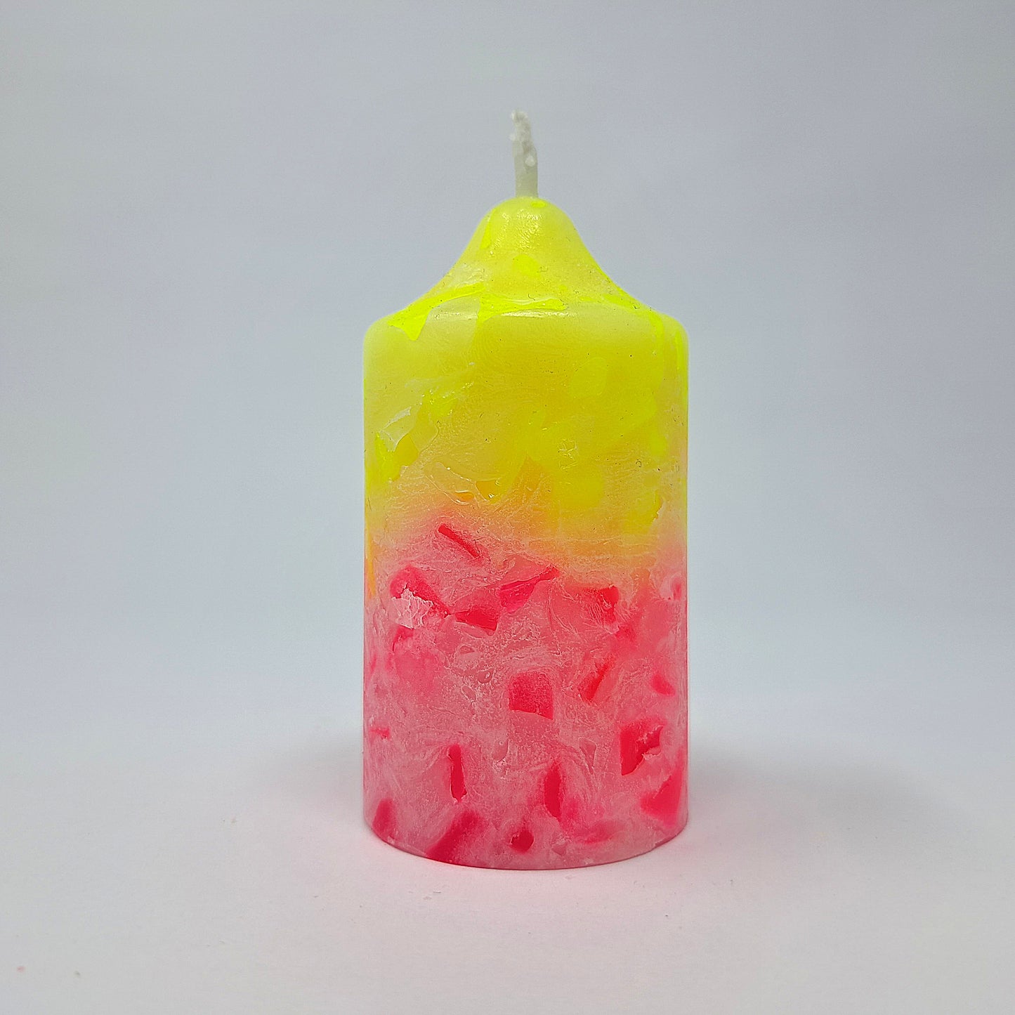 glockenkerze-neon-gelb-pink