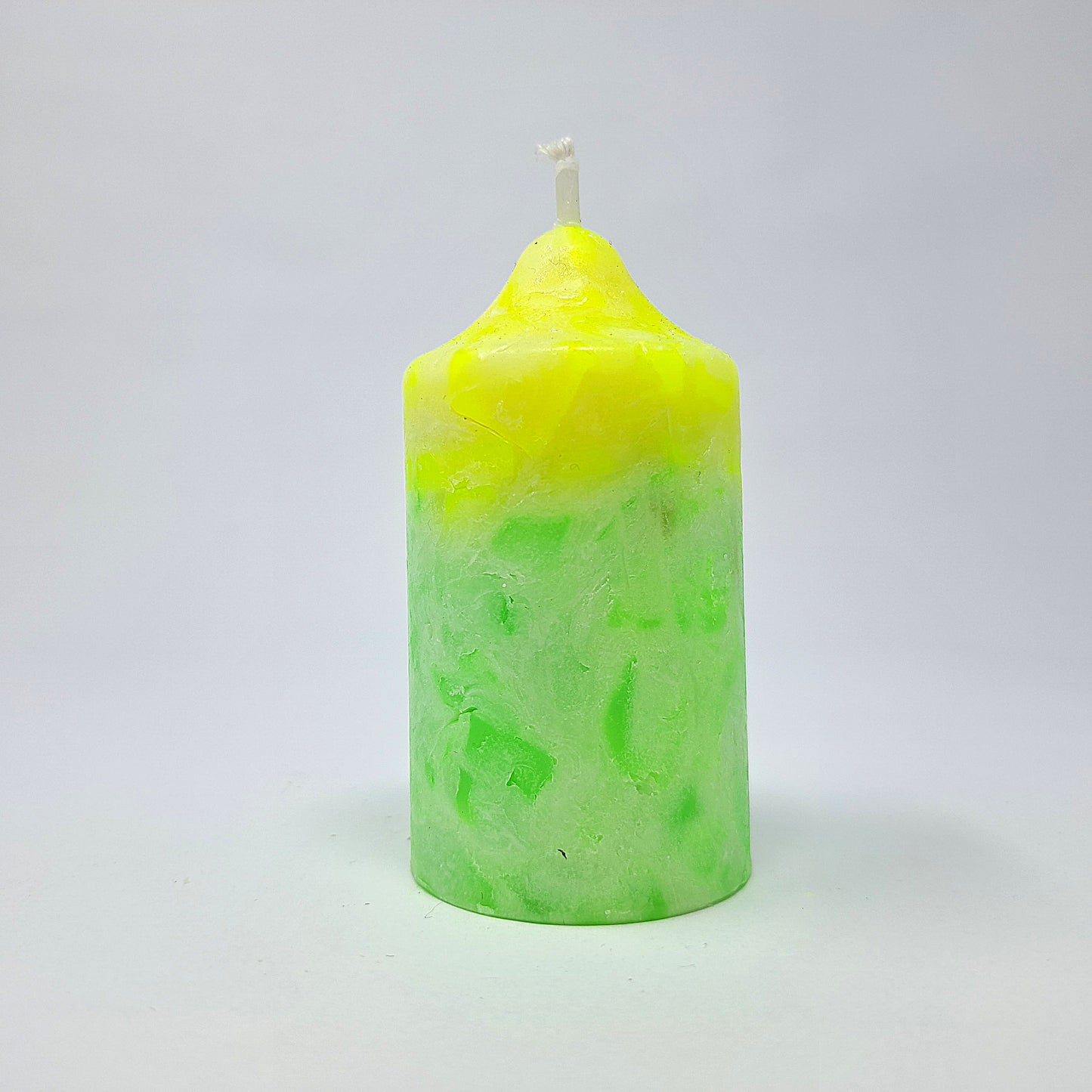 glockenkerze-neon-gelb-grün